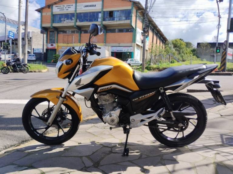 HONDA - CG 160 - 2021/2022 - Amarela - R$ 17.500,00